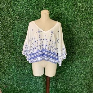 Embroidered top with flutter sleeves!